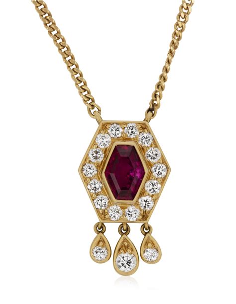 cartier ruby and diamond pendant.